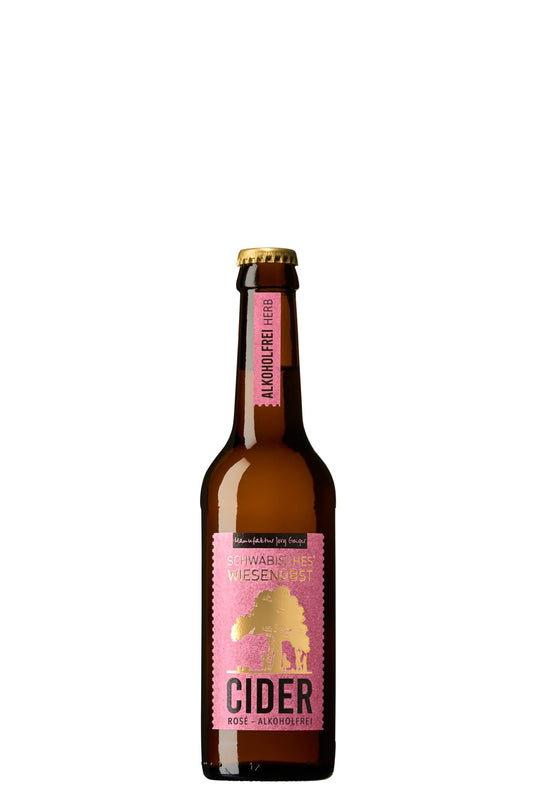 Delmosa non-alcoholic beverage bottle produced by Manufaktur Jörg Geiger, WiesenObst Cider Rosé with a pink and gold label, indicating the flavor of the cider with a pink and gold label, bottle cap on top, against a plain background. Sparkling. 330ml in size.