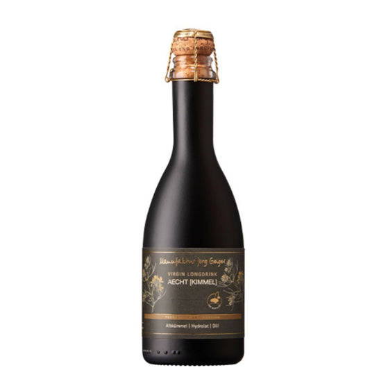 Delmosa import of Manufaktur Jörg Geiger Aecht Kimmel non-alcoholic sparkling beverage, 375ml black bottle with cork top, gold and white label, on a plain background